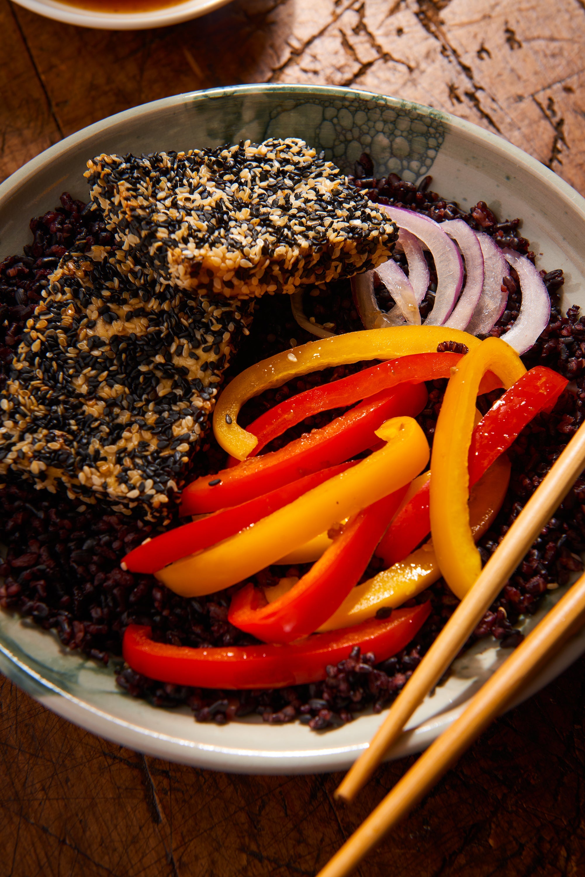 Sesame-Crusted Tofu with Garlic Forbidden Rice and Peppers